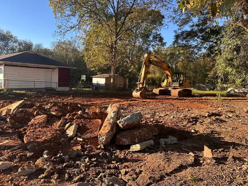 Lot after demolition with debris cleared