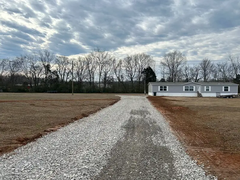 New gravel driveway finished to the house