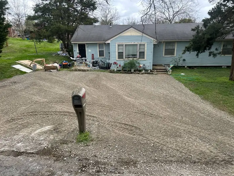 Regraded gravel driveway with a fresh surface