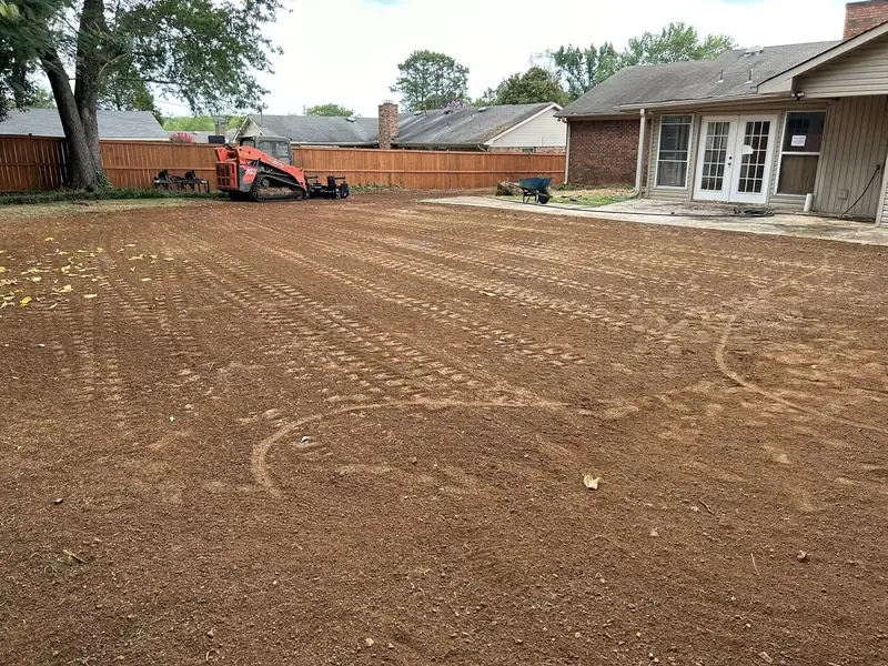Backyard graded smooth and ready for grass